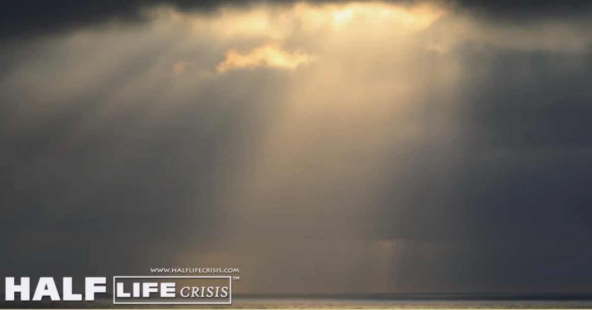 HLC Sun through the overcased clouds over the ocean web